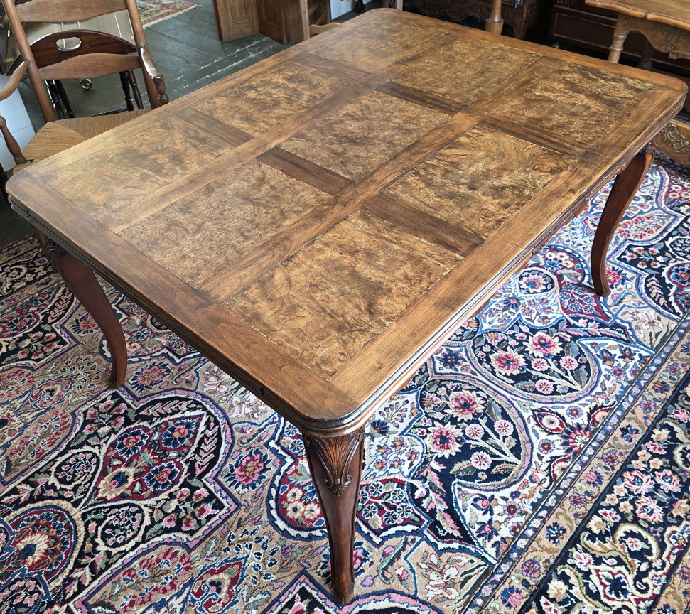 An extending French Louis XV Dining Table